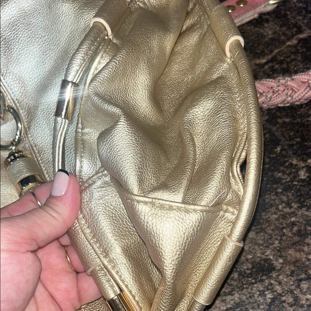 Big Buddha gold handbag